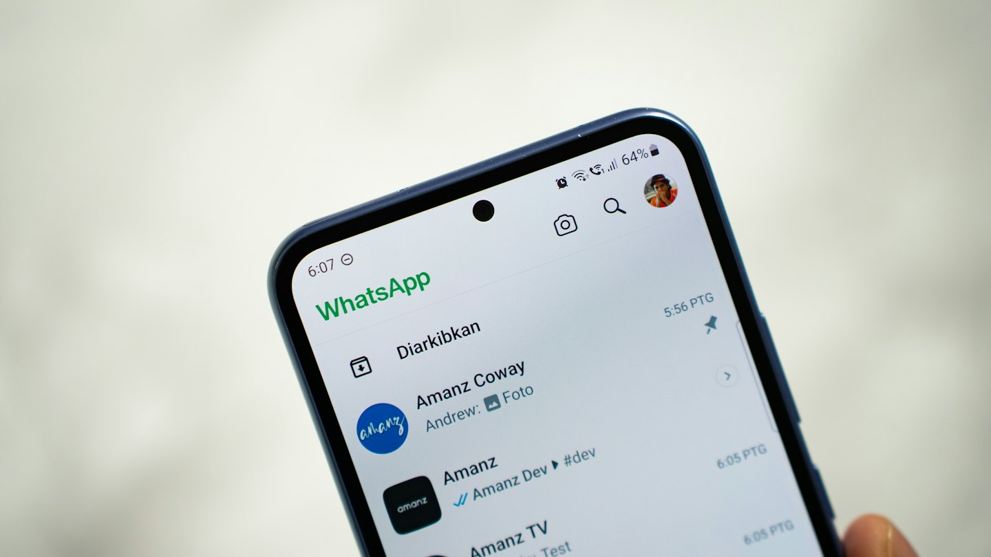 Smartphone screen showing WhatsApp chat list interface.